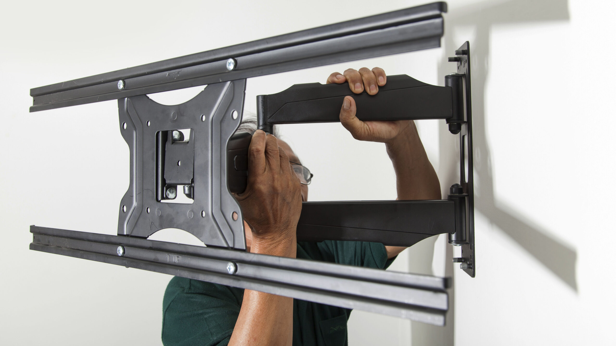 TV bracket installation drilling service in Dubai